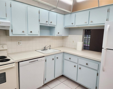 1005 Country Club Drive - Photo Thumbnail 1