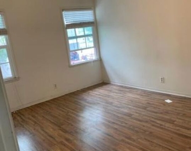 6128 Cashio Street - Photo Thumbnail 6