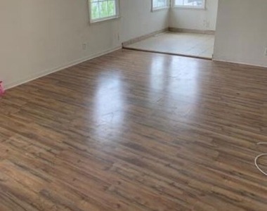 6128 Cashio Street - Photo Thumbnail 1