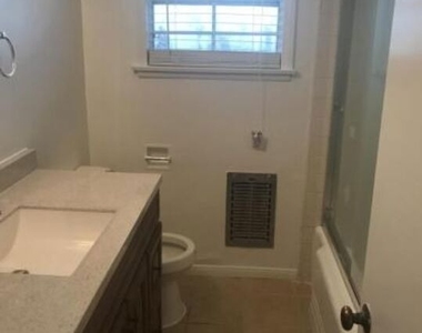 6128 Cashio Street - Photo Thumbnail 3