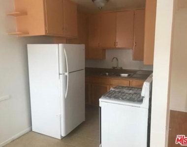 6128 Cashio Street - Photo Thumbnail 5