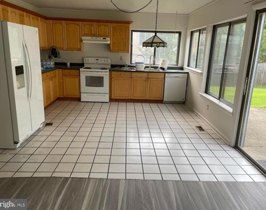 9129 Tulip Grove Road - Photo Thumbnail 3
