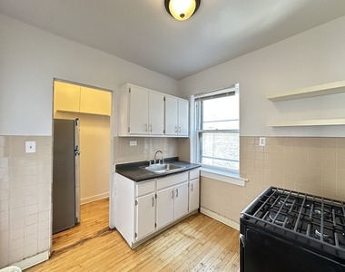 7147 S Constance Avenue - Photo Thumbnail 3