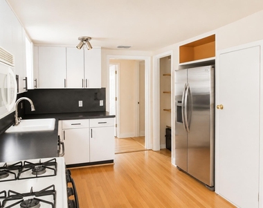 1410 W 51st St - Photo Thumbnail 4