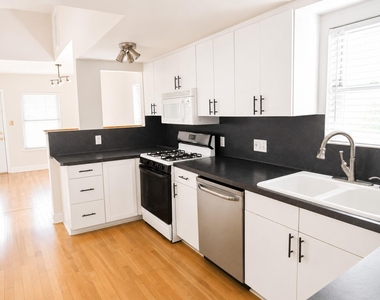 1410 W 51st St - Photo Thumbnail 5