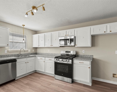7134 Prairie Village Drive - Photo Thumbnail 4