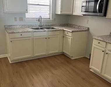 7813 Pruitt Drive - Photo Thumbnail 7
