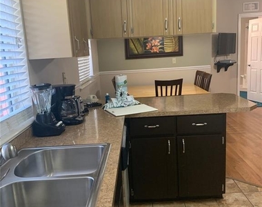 2777 N Poinciana Boulevard - Photo Thumbnail 7