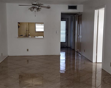 9340 Lagoon Place - Photo Thumbnail 2