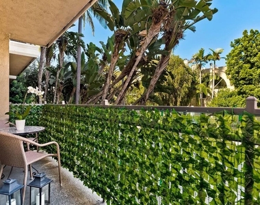141 S Clark Drive - Photo Thumbnail 2