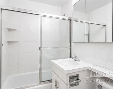 W 52ND ST - Photo Thumbnail 1