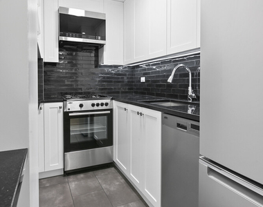 211 E 53rd Street - Photo Thumbnail 3