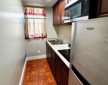 4618 Eastside Avenue - Photo Thumbnail 2
