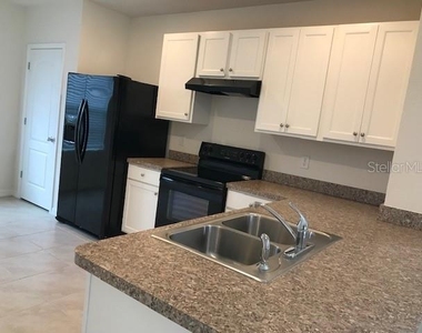 9035 Carlotta Way - Photo Thumbnail 6