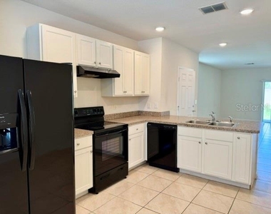 9035 Carlotta Way - Photo Thumbnail 7