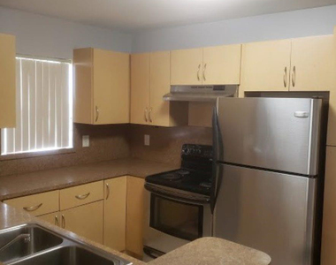4096 N Pine Island Road - Photo Thumbnail 5