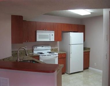 8781 Wiles Road - Photo Thumbnail 16