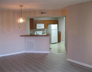 8781 Wiles Road - Photo Thumbnail 14
