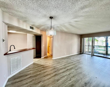 8781 Wiles Road - Photo Thumbnail 2