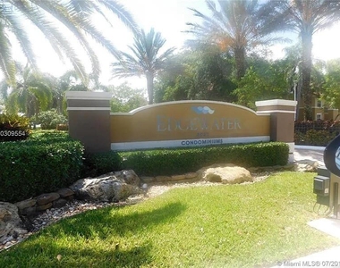 8781 Wiles Road - Photo Thumbnail 12