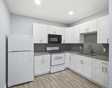 1411 E 24th Avenue - Photo Thumbnail 4