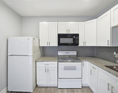 1411 E 24th Avenue - Photo Thumbnail 6