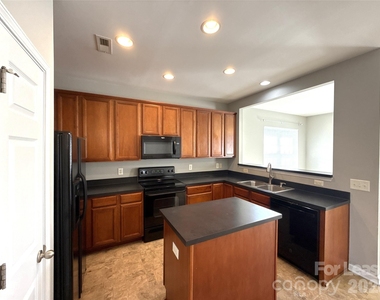 7023 Brighton Park Drive - Photo Thumbnail 7