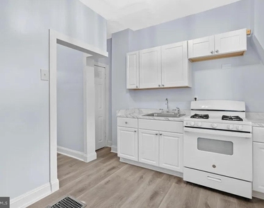 5919 N Norwood Street - Photo Thumbnail 2