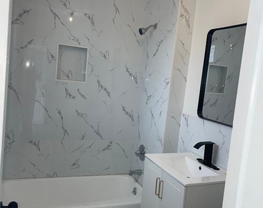 1253 East 89th Street - Photo Thumbnail 2