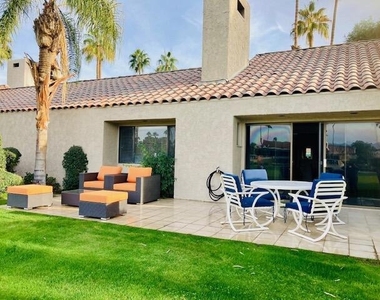 118 Racquet Club Drive S - Photo Thumbnail 1
