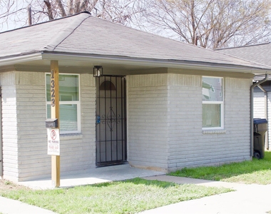 1323 E 32nd 1/2 Street - Photo Thumbnail 1