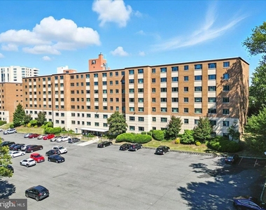 1200 S Arlington Ridge Road - Photo Thumbnail 1