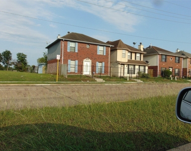 8603 Rustling Leaves Drive - Photo Thumbnail 2