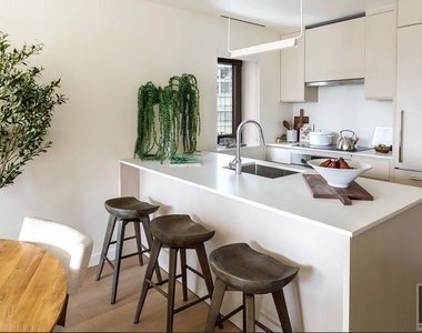 East 50 Street - Photo Thumbnail 1