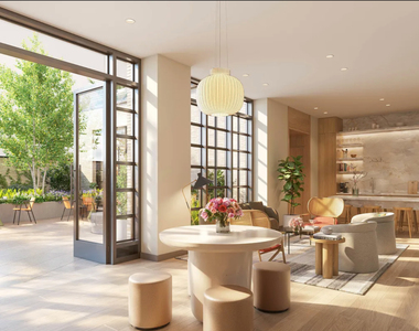 East 50 Street - Photo Thumbnail 5