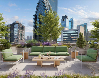 East 50 Street - Photo Thumbnail 3