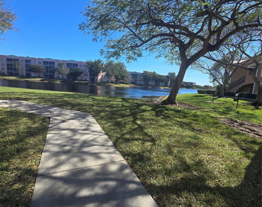 7970 N Nob Hill Road - Photo Thumbnail 16