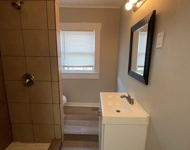 6913 Avenue L - Photo Thumbnail 10