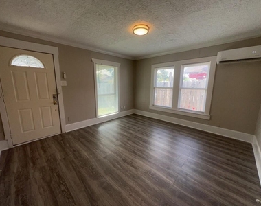 6913 Avenue L - Photo Thumbnail 1