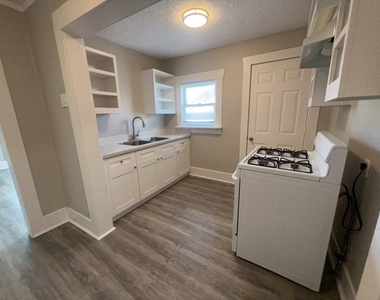 6913 Avenue L - Photo Thumbnail 4