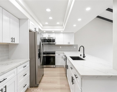 9374 Fleetwood Street - Photo Thumbnail 7