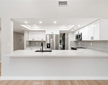9374 Fleetwood Street - Photo Thumbnail 8