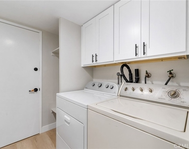 9374 Fleetwood Street - Photo Thumbnail 18