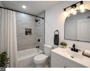 1233 W Venango Street - Photo Thumbnail 3