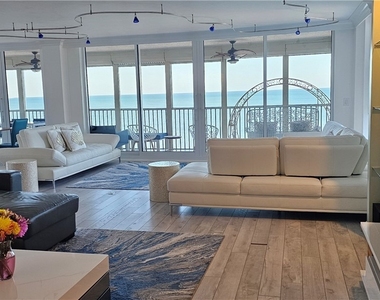 10691 Gulf Shore Drive E - Photo Thumbnail 1