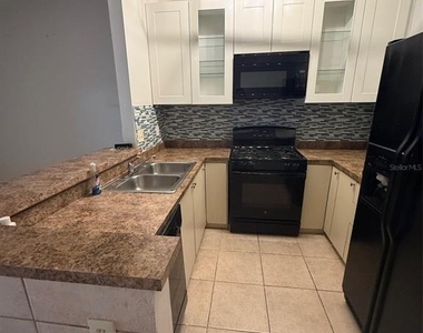 1009 Westside Drive - Photo Thumbnail 1
