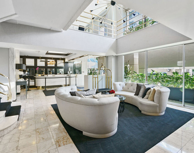 1131 Alta Loma Road - Photo Thumbnail 2