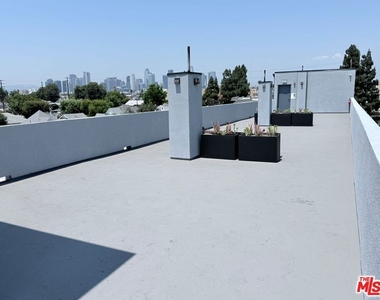 1039 E 28th Street - Photo Thumbnail 2