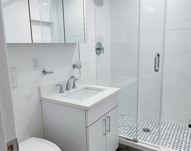 E 16 St - Photo Thumbnail 4