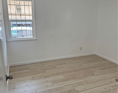 1310 W 89th Street - Photo Thumbnail 2